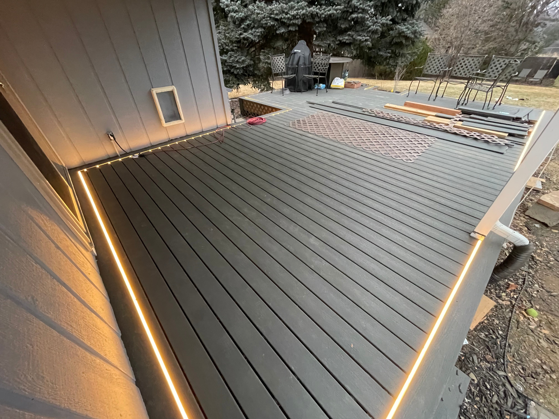 Close-up of finished deck boards with integrated LED strip lighting